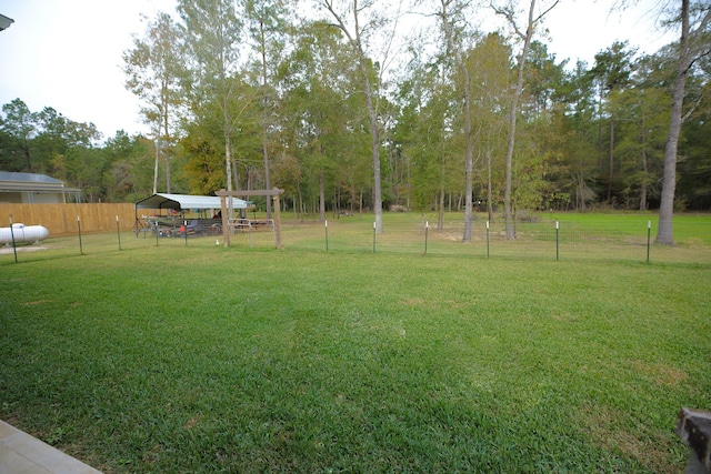 view of yard with a carport