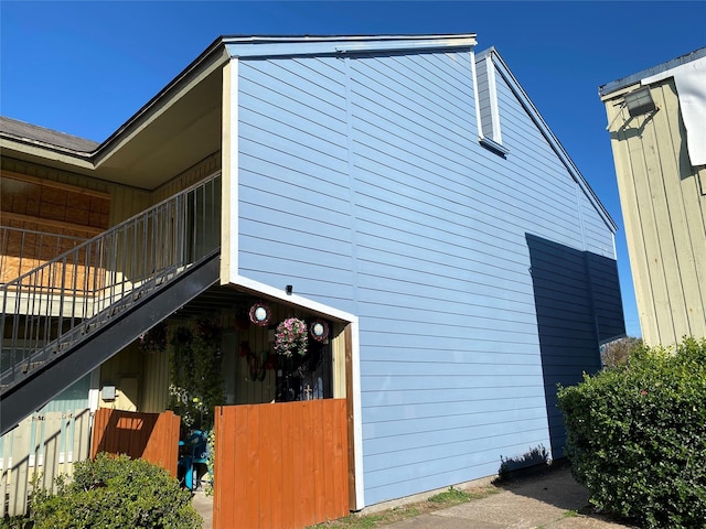 view of property exterior with a balcony