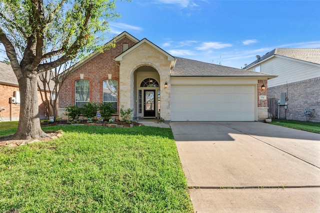 ranch-style house with a front yard and a garage