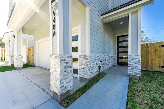 property entrance with a garage