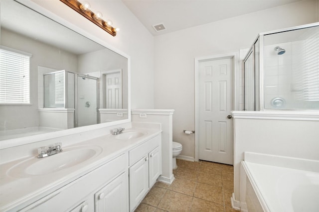 full bathroom featuring tile patterned floors, toilet, vanity, and shower with separate bathtub