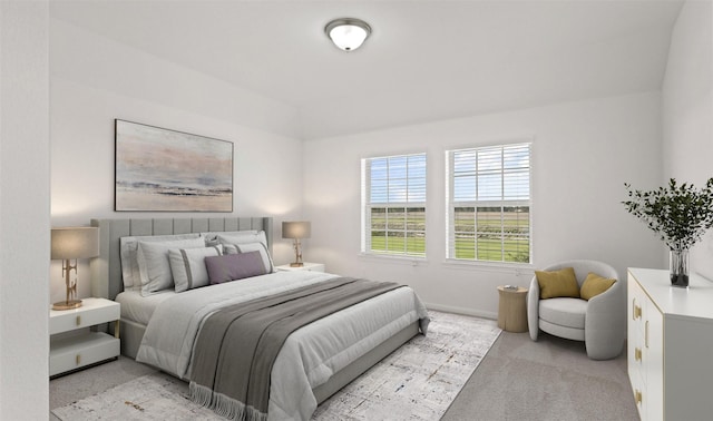 bedroom with light colored carpet