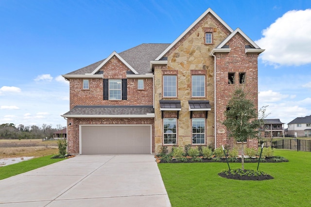 craftsman inspired home with a garage and a front lawn