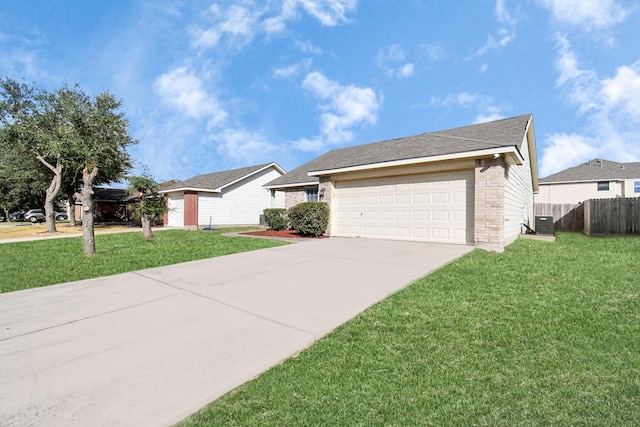 ranch-style home with central AC, a garage, and a front lawn