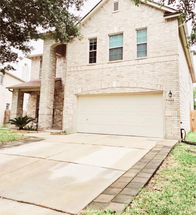 front of property featuring a garage