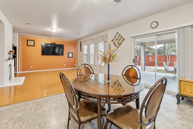 dining space featuring light hardwood / wood-style flooring