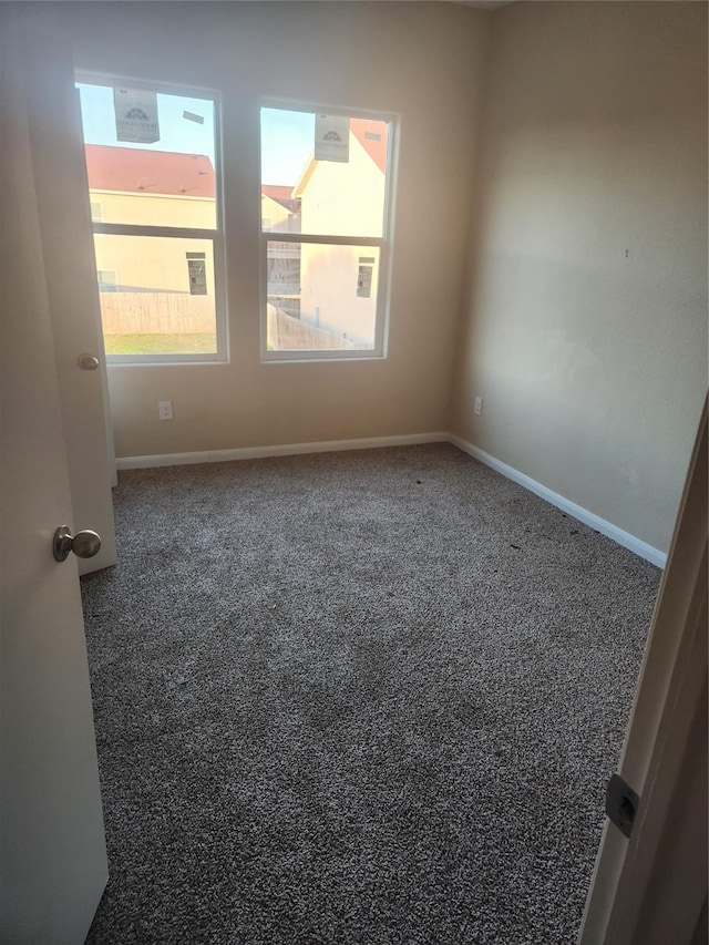 view of carpeted spare room