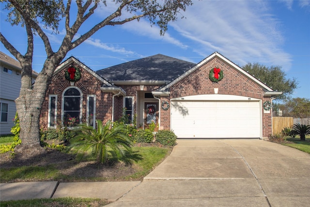 view of front of property featuring a garage