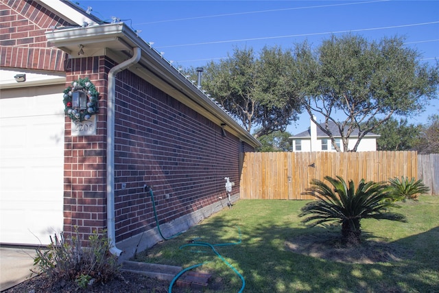 view of home's exterior with a lawn