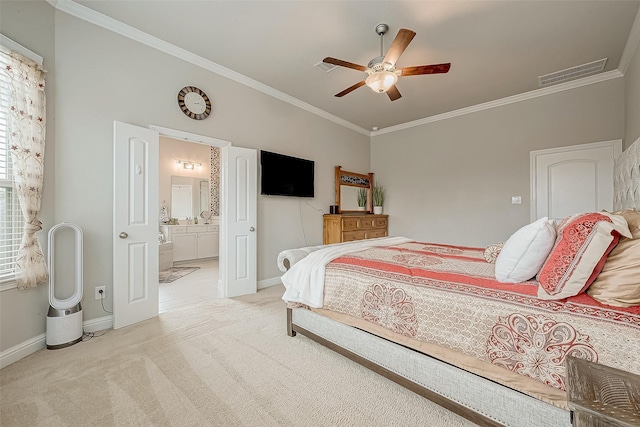 bedroom with ceiling fan, crown molding, ensuite bathroom, and light carpet