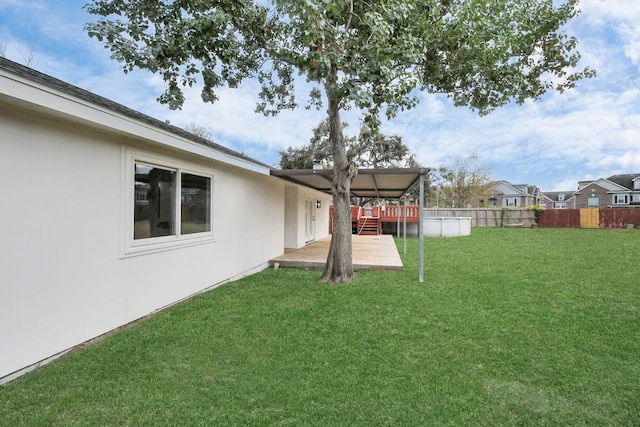 view of yard featuring a swimming pool side deck