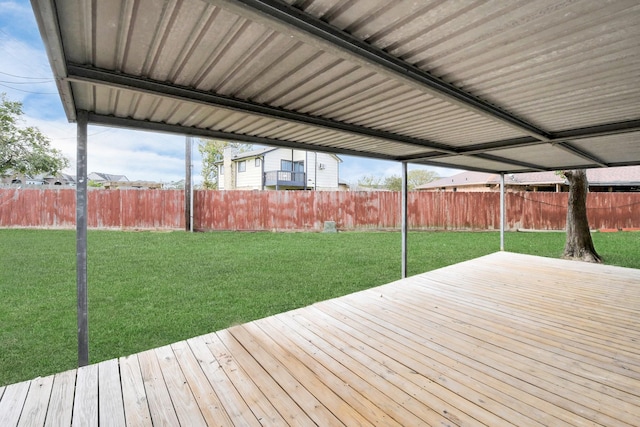 wooden terrace with a yard