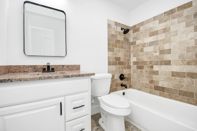 full bathroom featuring vanity, tiled shower / bath combo, and toilet