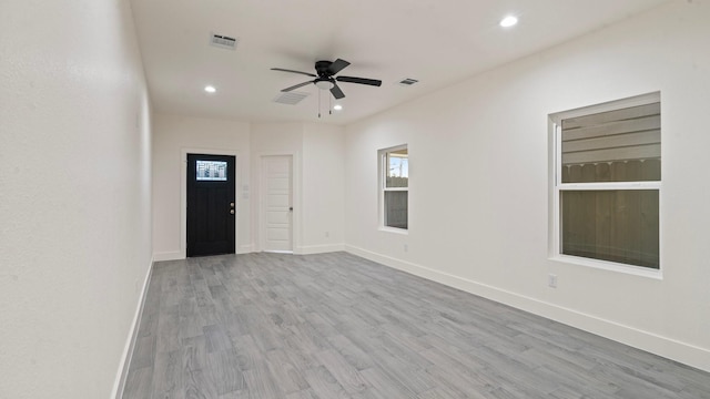 interior space featuring ceiling fan and light hardwood / wood-style floors