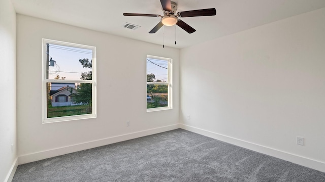 unfurnished room featuring carpet floors and ceiling fan