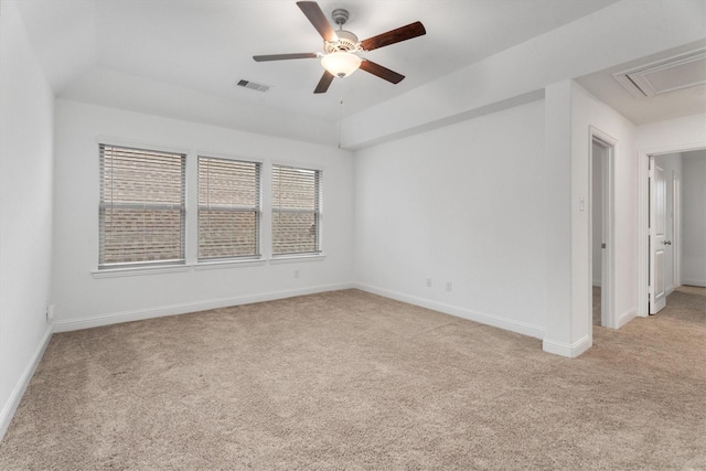 carpeted empty room featuring ceiling fan