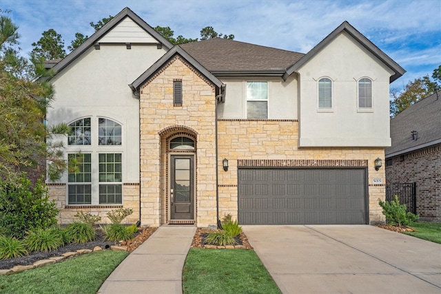 view of front of home with a garage