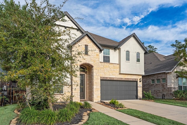 view of front of property featuring a garage