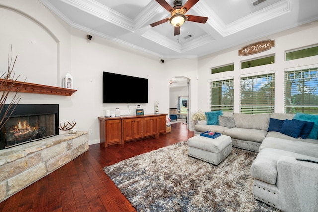 living room featuring coffered ceiling, ceiling fan, crown molding, dark wood-type flooring, and beamed ceiling