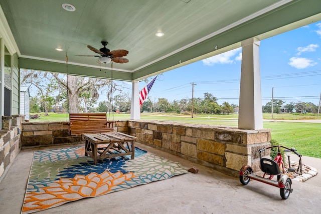 view of patio featuring ceiling fan