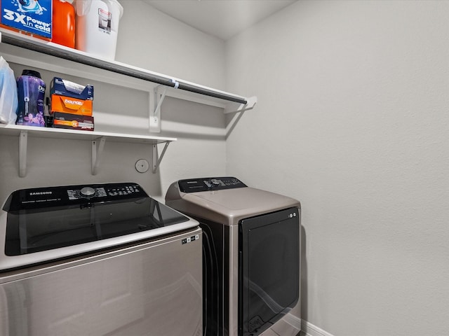 laundry room with washer and clothes dryer