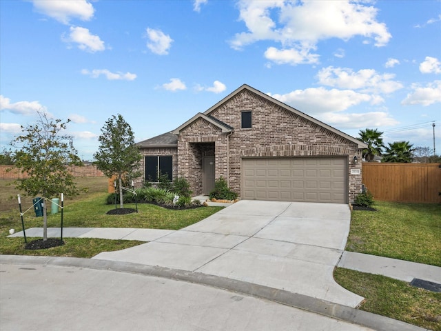 view of front facade with a front yard and a garage