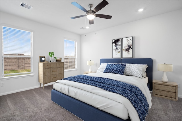 bedroom featuring recessed lighting, carpet flooring, a ceiling fan, visible vents, and baseboards