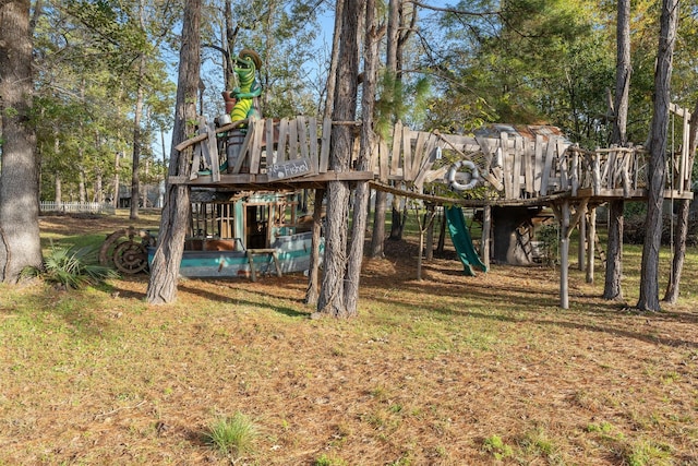 view of jungle gym with a yard