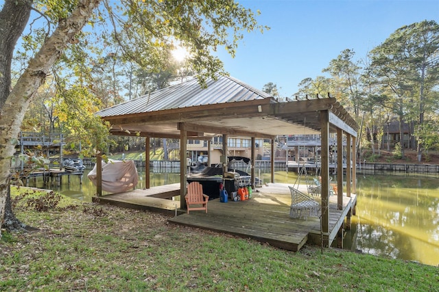 dock area featuring a water view