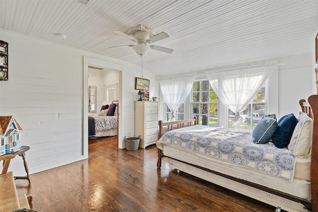 bedroom featuring ceiling fan, wood-type flooring, and wood ceiling