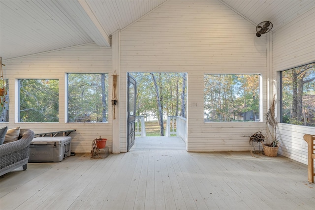 unfurnished sunroom with vaulted ceiling and wooden ceiling