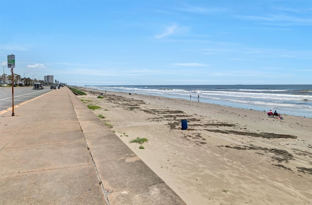 property view of water featuring a beach view