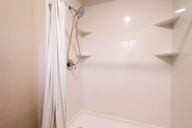 bathroom with walk in shower