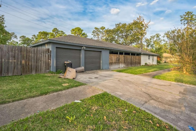 garage with a yard