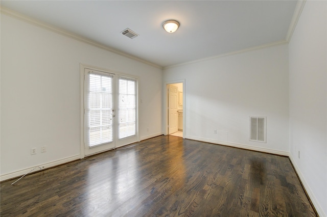 spare room with dark hardwood / wood-style flooring, french doors, and ornamental molding