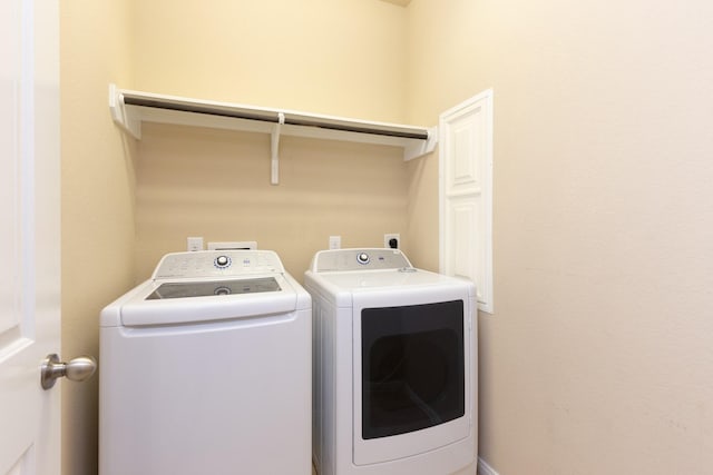 laundry area featuring washing machine and dryer