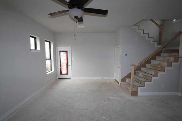 interior space featuring ceiling fan