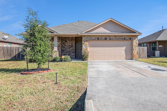 ranch-style home featuring a front lawn and a garage