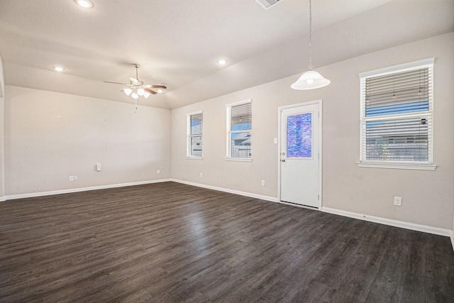 interior space with dark hardwood / wood-style floors and ceiling fan