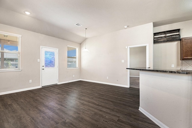 unfurnished living room with dark hardwood / wood-style floors