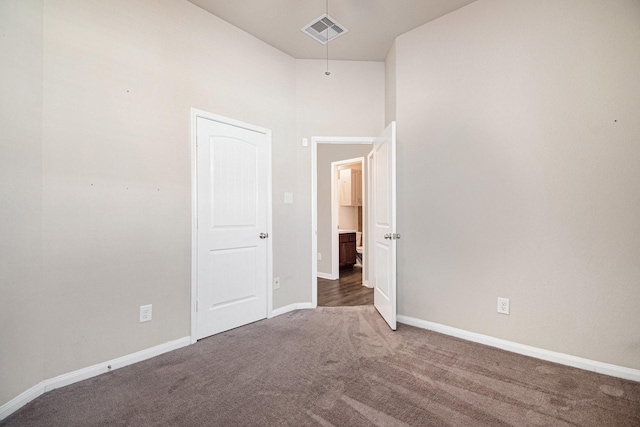 unfurnished bedroom featuring carpet floors