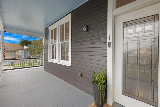 deck featuring covered porch