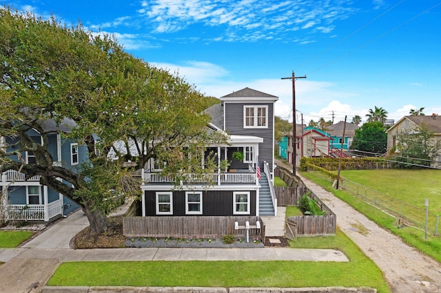 view of front of property with a balcony