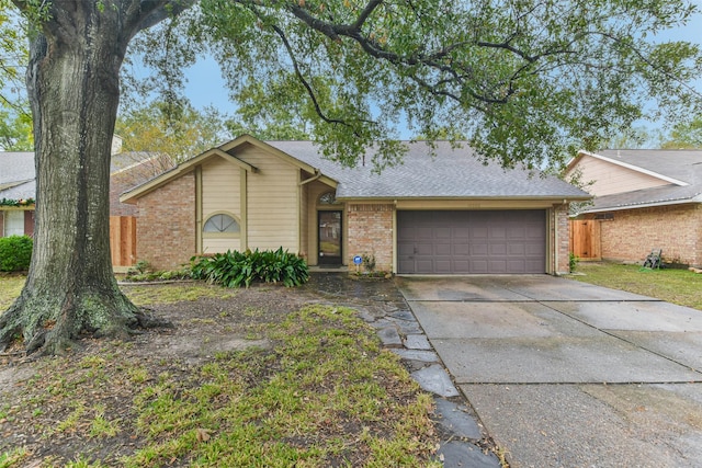 single story home featuring a garage