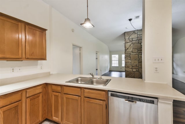 kitchen featuring dishwasher, sink, hanging light fixtures, kitchen peninsula, and lofted ceiling