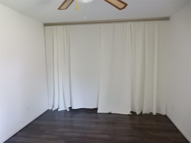 10306 Wayward Wind Ln, Houston, TX 77064 - empty room with a ceiling fan and dark wood-style floors