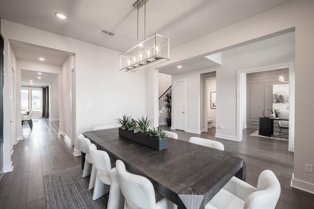 dining area featuring dark hardwood / wood-style floors