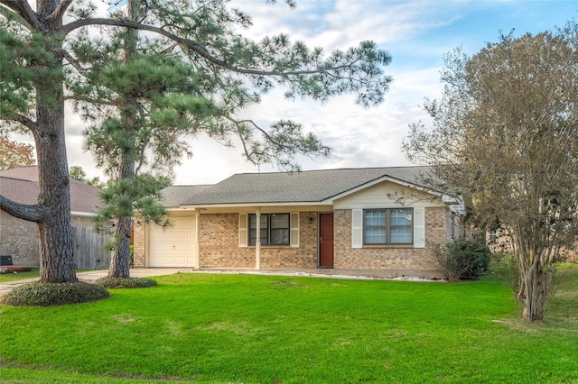 single story home featuring a garage and a front lawn