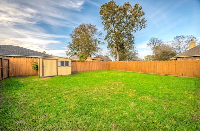 view of yard with a shed