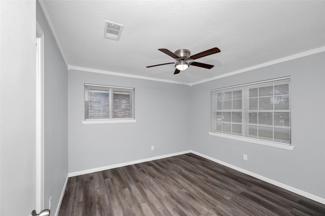 unfurnished room with a textured ceiling, ceiling fan, crown molding, and dark wood-type flooring